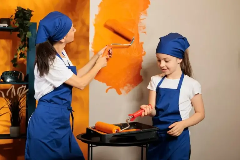 small-family-painting-orange-walls_482257-47748